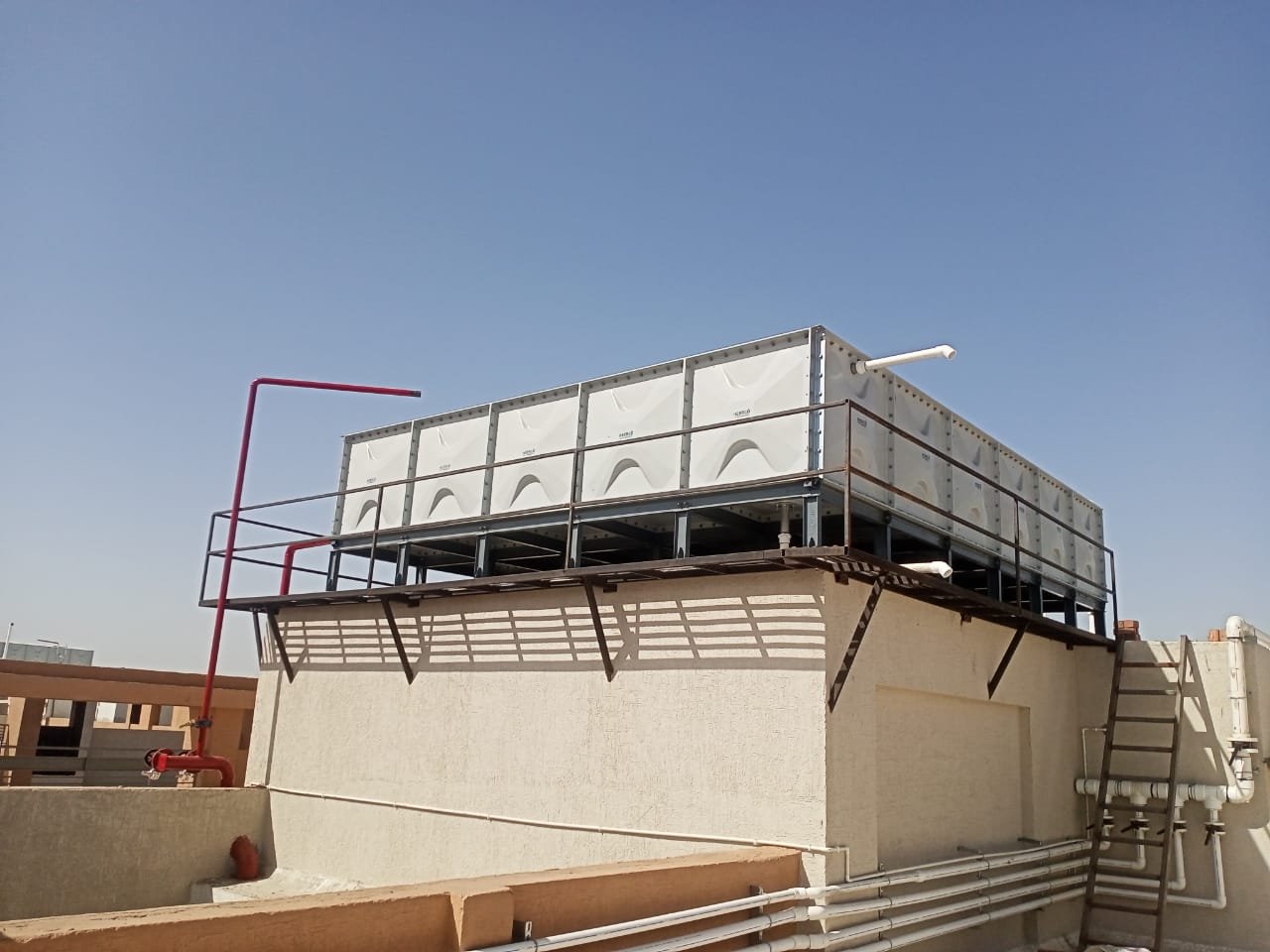 grp water tank roof level installation